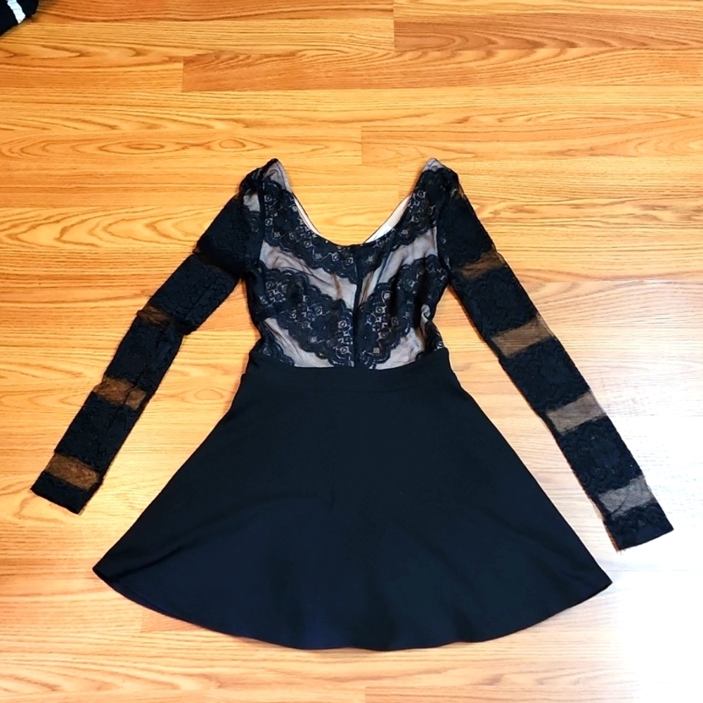 Charlotte russ flare ,see through sleeves black dress